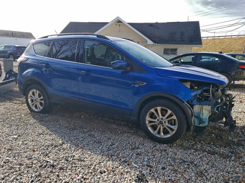 Photo 4 from auction – 2018 FORD ESCAPE SE with VIN 1FMCU9GD6JUA08219
