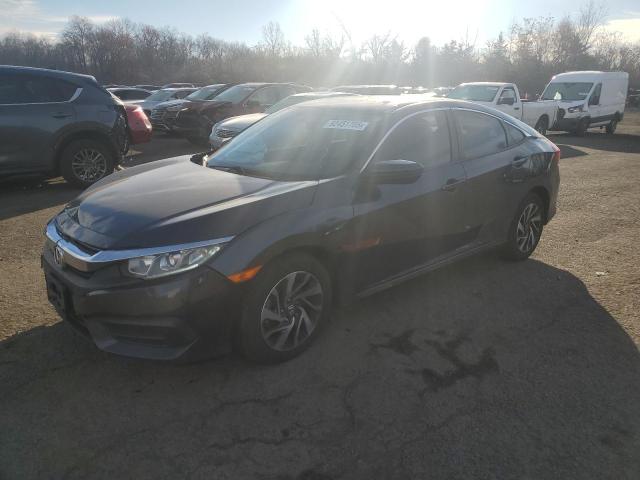 HONDA CIVIC 2018 with VIN 2HGFC2F77JH579858 - Photo from auction