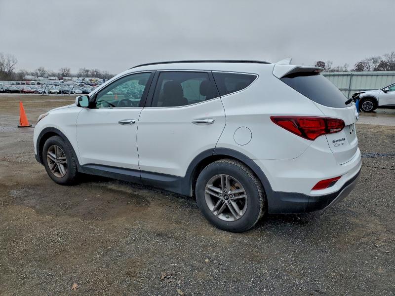 Photo 2 from auction – 2017 HYUNDAI SANTA FE S with VIN 5NMZU3LB2HH003214