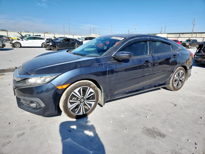 HONDA CIVIC EX 2017 with VIN 2HGFC1E33HH652677 - Photo from auction