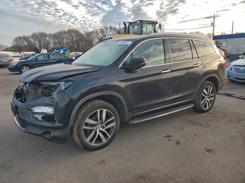 Photo 1 from auction – 2017 HONDA PILOT TOUR with VIN 5FNYF6H94HB086661