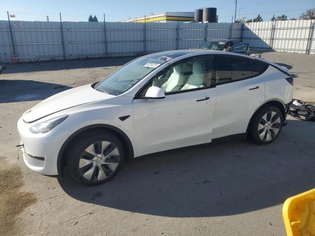 TESLA MODEL Y 2023 with VIN 7SAYGAEE6PF861688 - Photo from auction