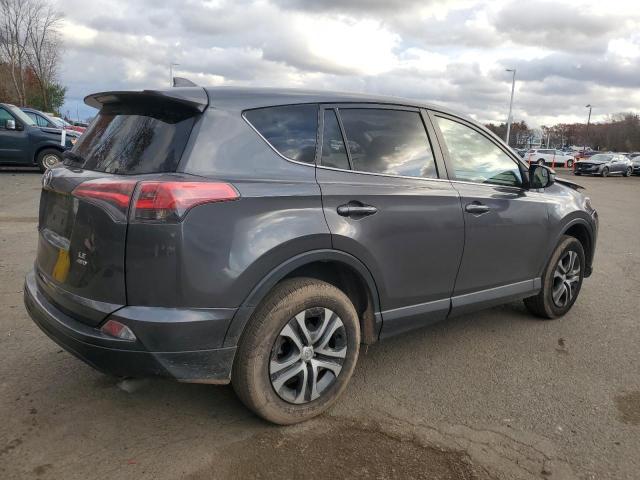 Photo 3 from auction – 2018 TOYOTA RAV4 LE with VIN JTMBFREV4JJ218034