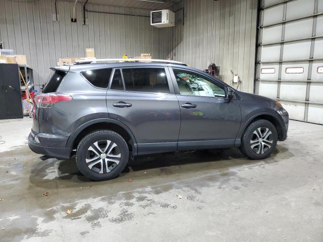 Photo 3 from auction – 2017 TOYOTA RAV4 LE with VIN JTMBFREV1HJ711454