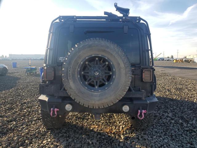 Photo 6 from auction – 2011 JEEP WRANGLER U with VIN 1J4BA5H14BL532752