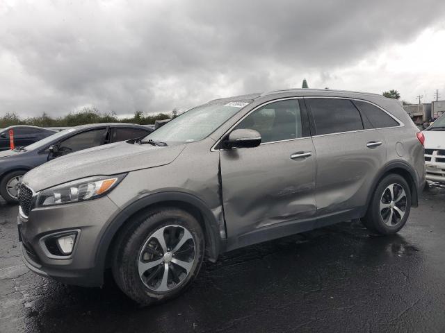 KIA SORENTO EX 2016 with VIN 5XYPH4A59GG048027 - Photo from auction