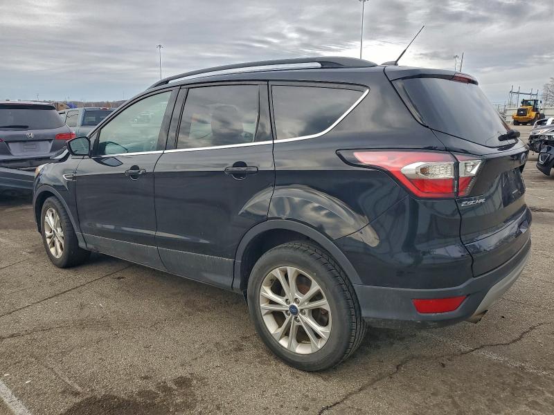Photo 2 from auction – 2017 FORD ESCAPE SE with VIN 1FMCU0GDXHUD37950