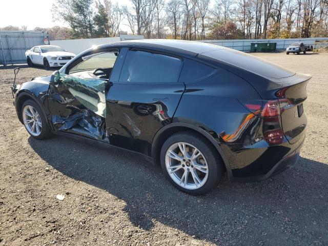 Photo 2 from auction – 2023 TESLA MODEL Y with VIN 7SAYGDEE3PF862380