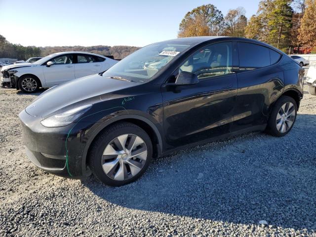 TESLA MODEL Y 2023 with VIN 7SAYGDEE8PA144076 - Photo from auction