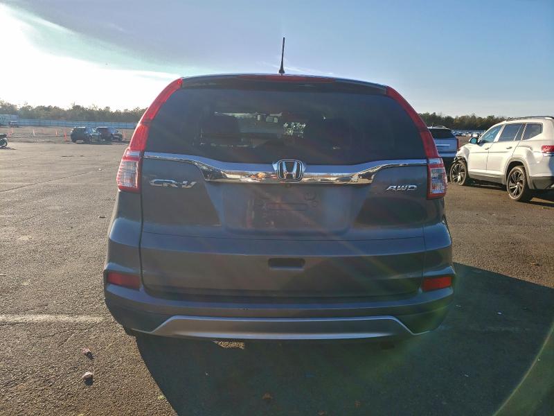 Photo 6 from auction – 2015 HONDA CR-V EX with VIN 5J6RM4H59FL053963
