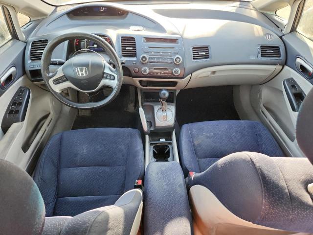 Photo 8 from auction – 2006 HONDA CIVIC HYBR with VIN JHMFA36286S801675