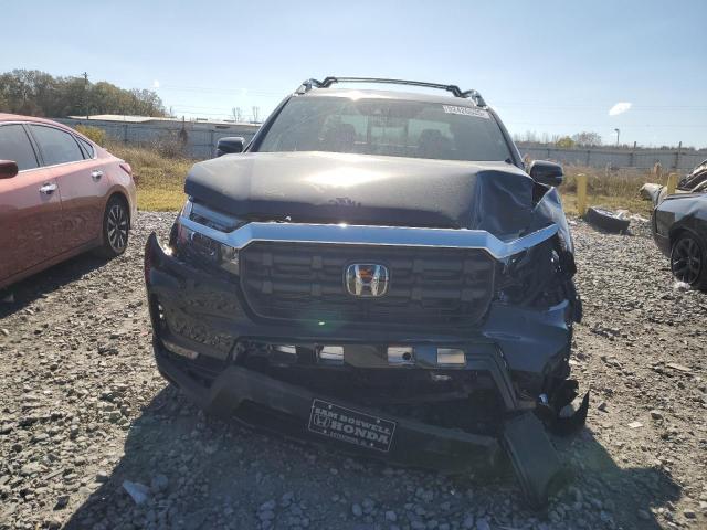 Photo 5 from auction – 2025 HONDA RIDGELINE with VIN 5FPYK3F55SB035291