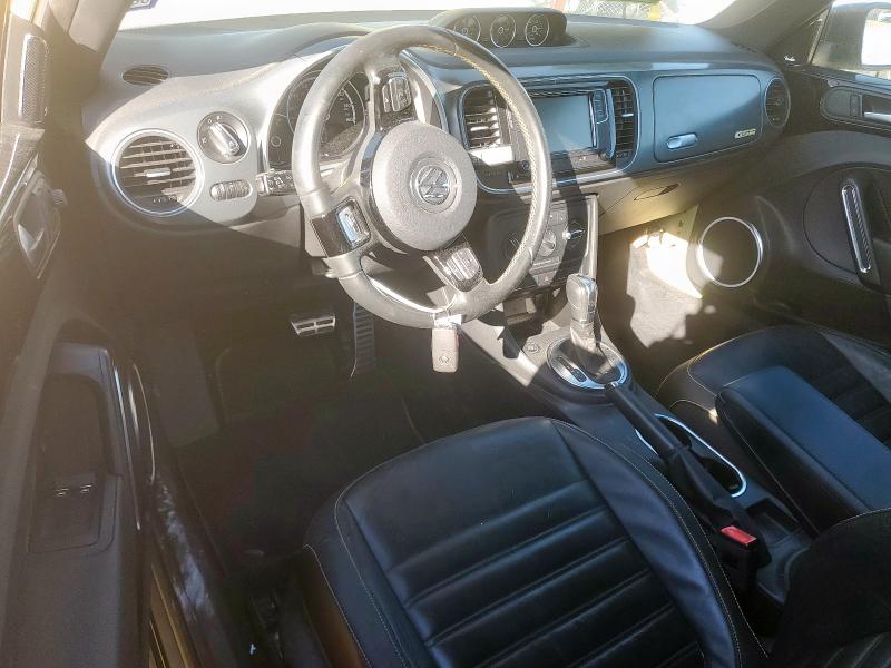 Photo 8 from auction – 2014 VOLKSWAGEN BEETLE TUR with VIN 3VWVS7AT4EM622569