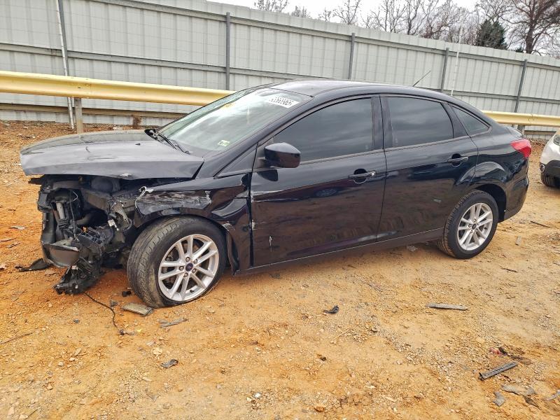FORD FOCUS SE 2018 with VIN 1FADP3F21JL291749 - Photo from auction