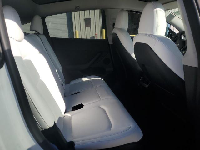 Photo 10 from auction – 2023 TESLA MODEL Y with VIN 7SAYGAEE6PF861688