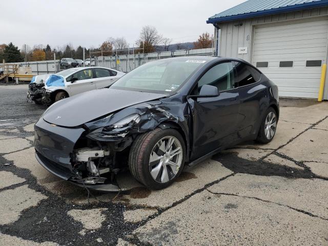 TESLA MODEL Y 2022 with VIN 7SAYGAEE0NF520722 - Photo from auction