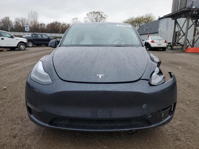 Photo 5 from auction – 2025 TESLA MODEL Y with VIN 7SAYGDEE5SF298479