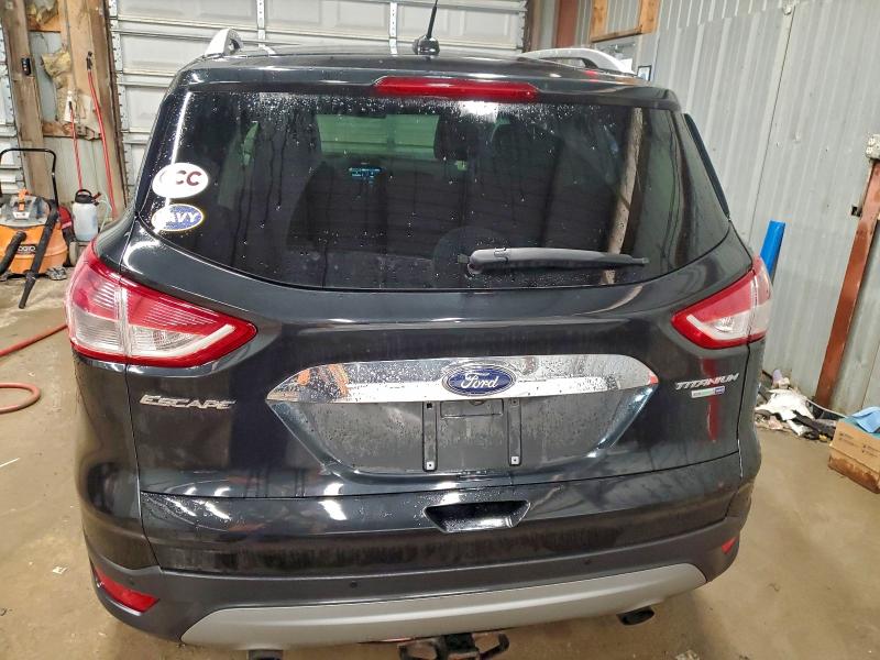 Photo 6 from auction – 2015 FORD ESCAPE TIT with VIN 1FMCU9J95FUA28909