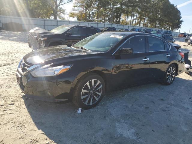 NISSAN ALTIMA 2.5 2017 with VIN 1N4AL3AP7HC156125 - Photo from auction