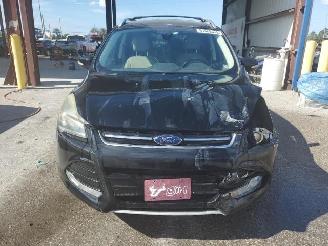 Photo 5 from auction – 2016 FORD ESCAPE TIT with VIN 1FMCU0J91GUA36003