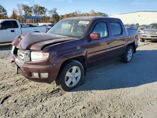 HONDA RIDGELINE 2011 with VIN 5FPYK1F51BB006679 - Photo from auction
