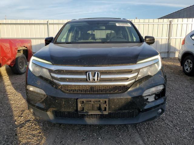 Photo 5 from auction – 2016 HONDA PILOT EXL with VIN 5FNYF6H5XGB007277