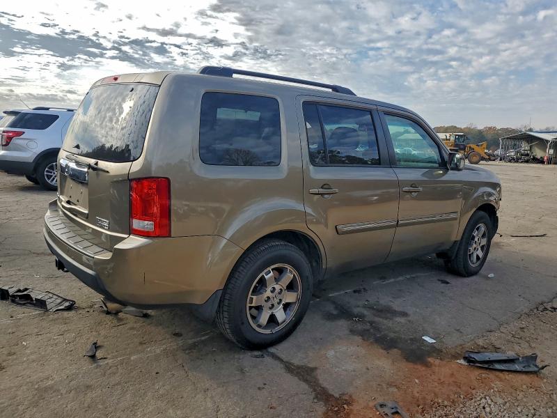 Photo 3 from auction – 2011 HONDA PILOT TOUR with VIN 5FNYF4H90BB008924