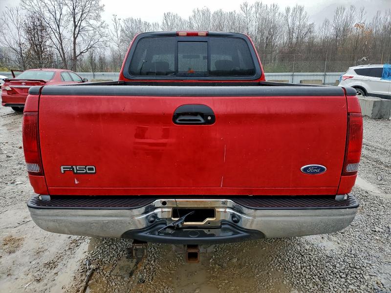 Photo 6 from auction – 2002 FORD F150 with VIN 1FTRX18L02NA74919