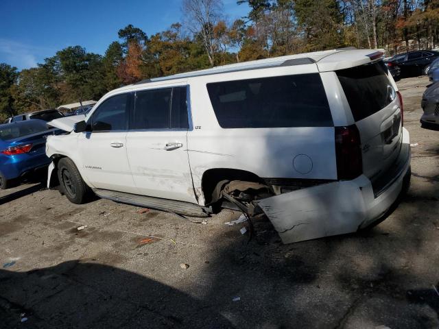 Photo 2 from auction – 2015 CHEVROLET SUBURBAN with VIN 1GNSKKKC4FR245997