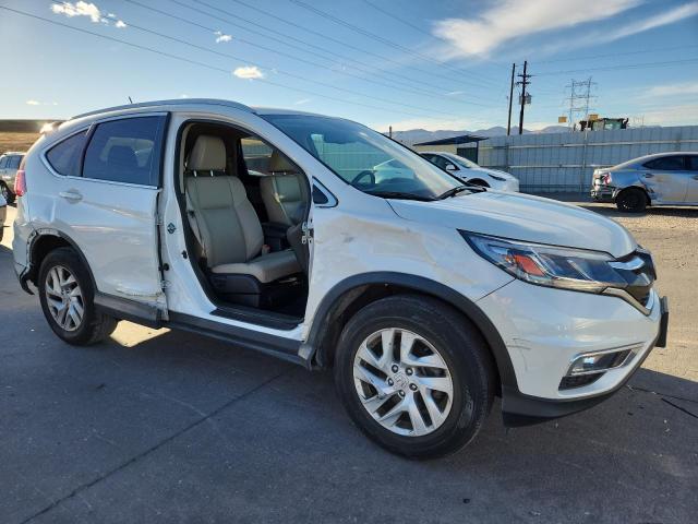 Photo 4 from auction – 2016 HONDA CR-V EXL with VIN 5J6RM4H72GL002100