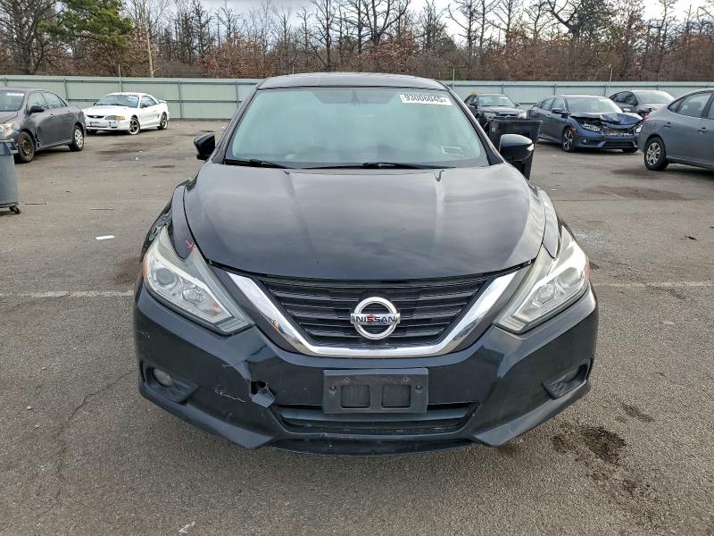 Photo 5 from auction – 2016 NISSAN ALTIMA 2.5 with VIN 1N4AL3AP2GC142244
