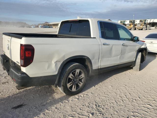 Photo 3 from auction – 2019 HONDA RIDGELINE with VIN 5FPYK3F75KB029332