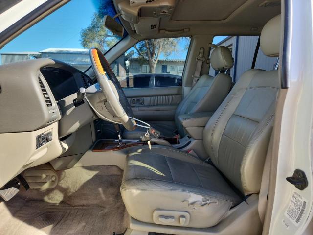 Photo 7 from auction – 2003 INFINITI QX4 with VIN JNRDR09Y83W301293