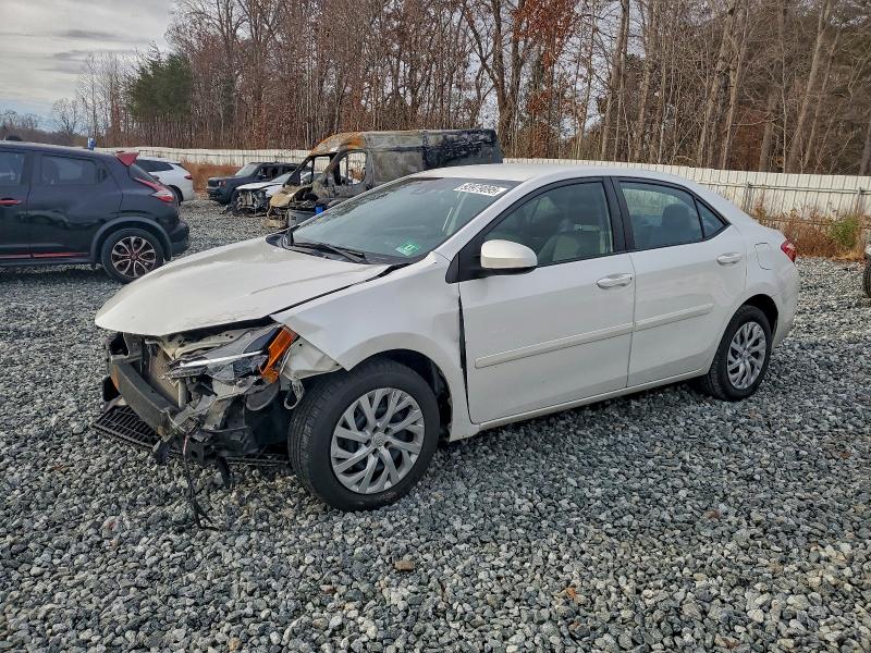 TOYOTA COROLLA L 2018 with VIN 5YFBURHE1JP851300 - Photo from auction