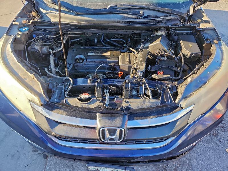 Photo 12 from auction – 2015 HONDA CR-V with VIN 2HKRM4H75FH664147