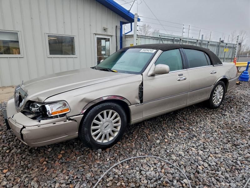 LINCOLN TOWN CAR E 2003 with VIN 1LNHM81W13Y606384 - Photo from auction