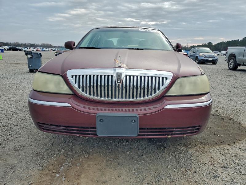 Photo 5 from auction – 2003 LINCOLN TOWN CAR E with VIN 1LNHM81W93Y697775