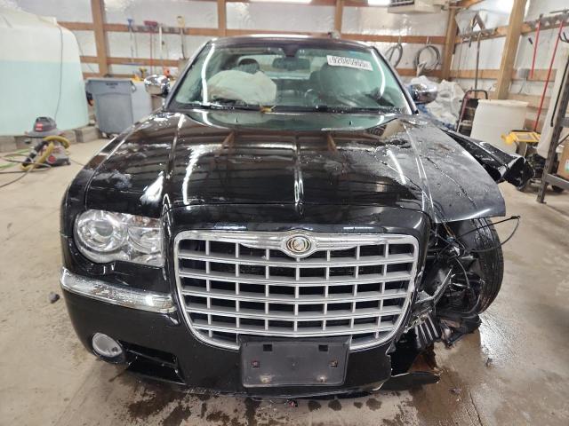 Photo 5 from auction – 2009 CHRYSLER 300C with VIN 2C3KA63T39H582400