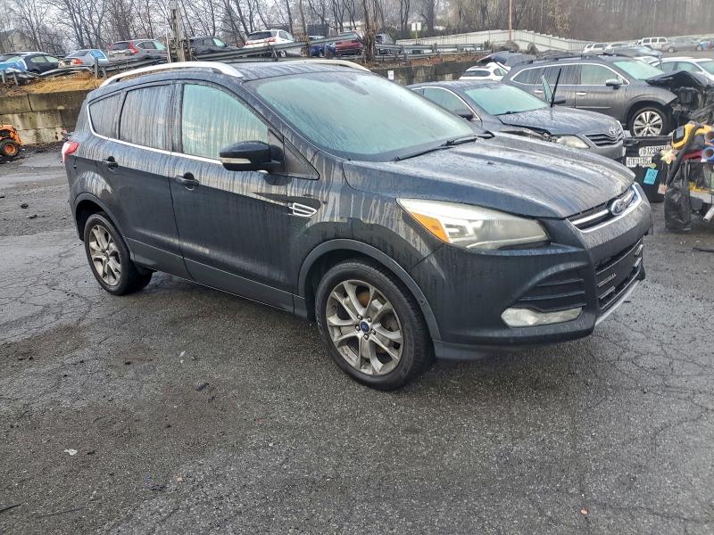 Photo 4 from auction – 2014 FORD ESCAPE TIT with VIN 1FMCU9J92EUB21563