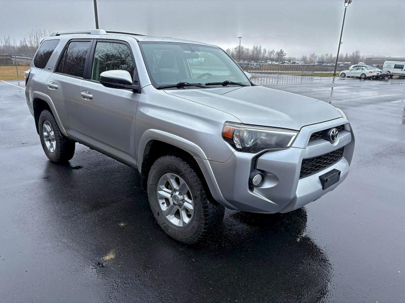 TOYOTA 4RUNNER SR 2014 with VIN JTEBU5JR1E5201502 - Photo from auction