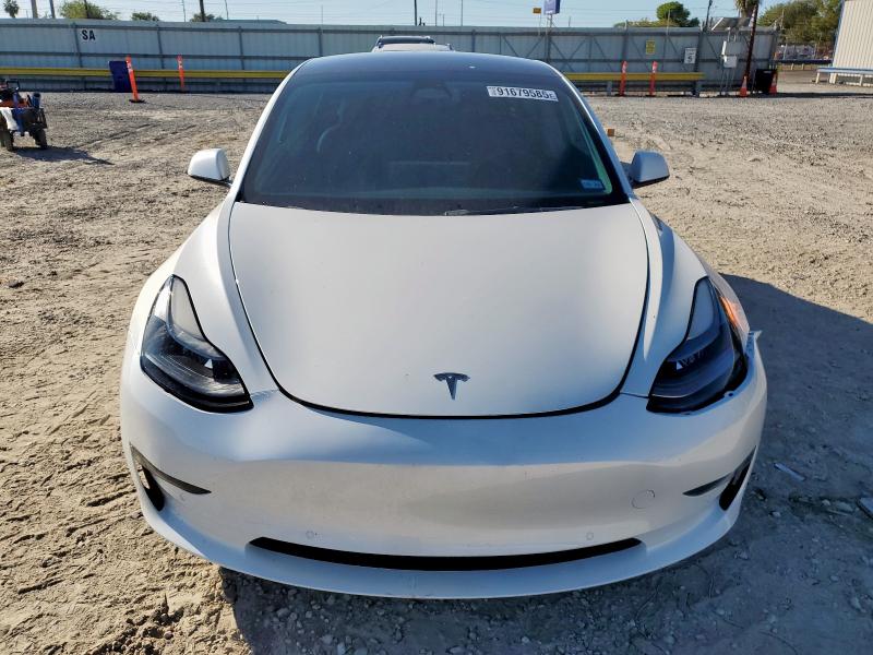Photo 5 from auction – 2022 TESLA MODEL 3 with VIN 5YJ3E1EA5NF301961