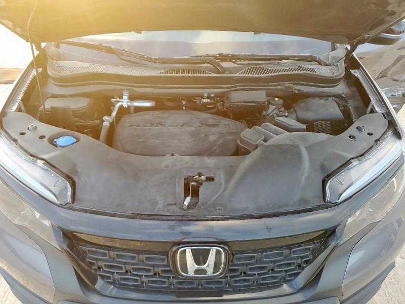 Photo 12 from auction – 2021 HONDA PASSPORT E with VIN 5FNYF7H58MB000331