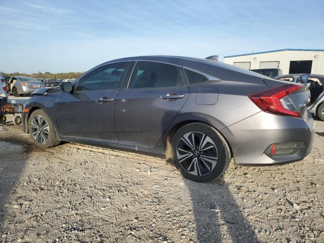 Photo 2 from auction – 2017 HONDA CIVIC EXL with VIN 19XFC1F75HE025247