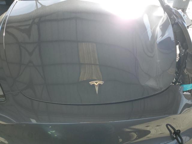 Photo 11 from auction – 2023 TESLA MODEL Y with VIN 7SAYGDED5PF956414