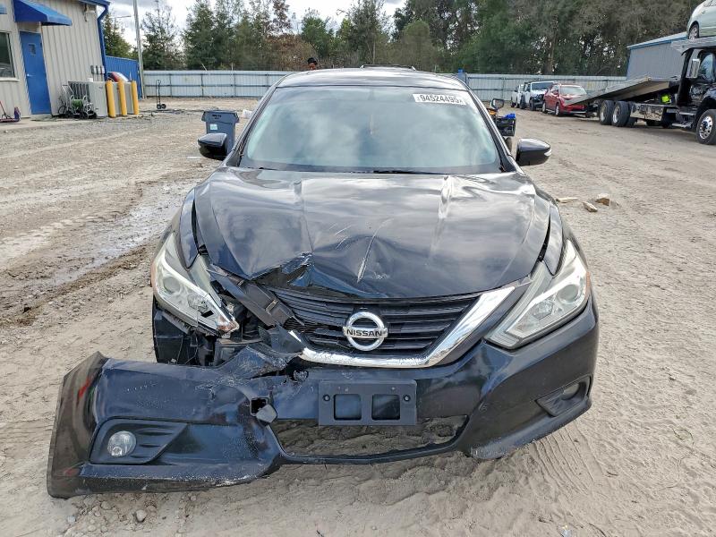 Photo 5 from auction – 2017 NISSAN ALTIMA with VIN 1N4AL3AP4HC187008