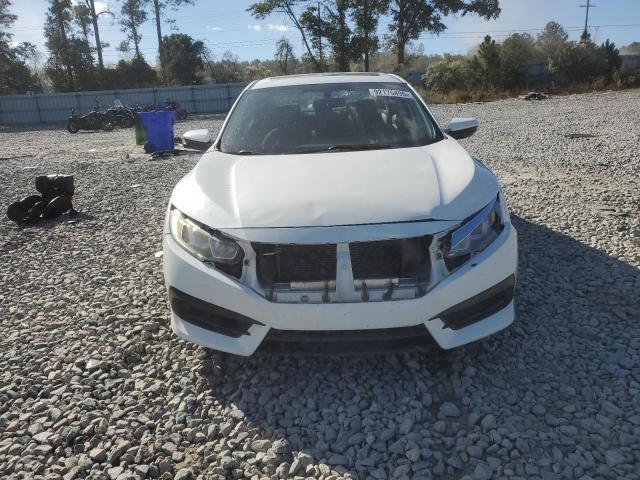 Photo 5 from auction – 2018 HONDA CIVIC EX with VIN 19XFC2F78JE032172