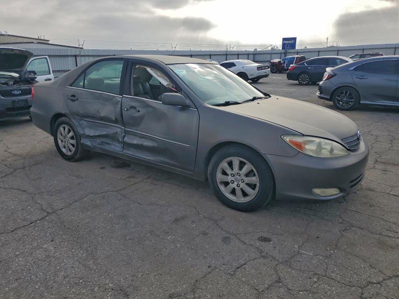 Photo 4 from auction – 2004 TOYOTA CAMRY with VIN 4T1BE30K74U856404
