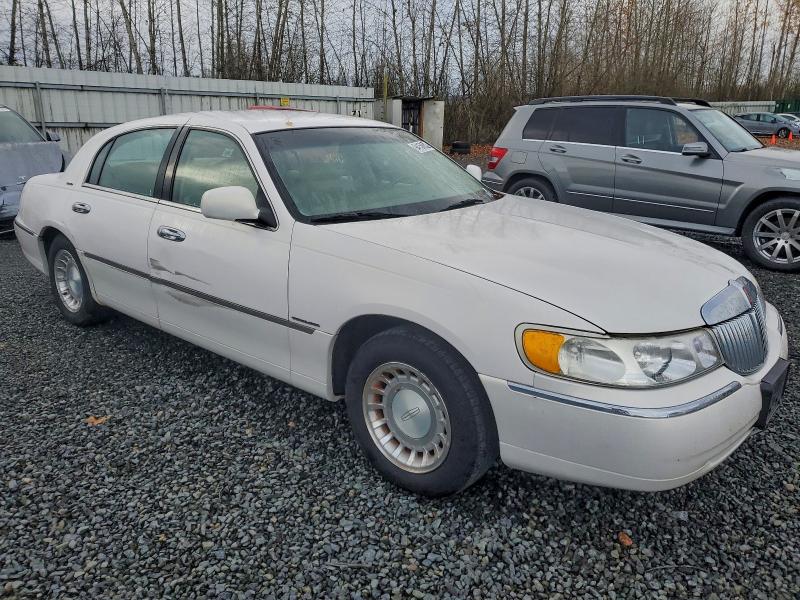 Photo 4 from auction – 2000 LINCOLN TOWN CAR E with VIN 1LNHM81W5YY765769