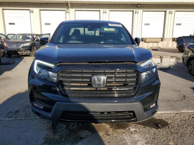 Photo 5 from auction – 2023 HONDA RIDGELINE with VIN 5FPYK3F86PB004763