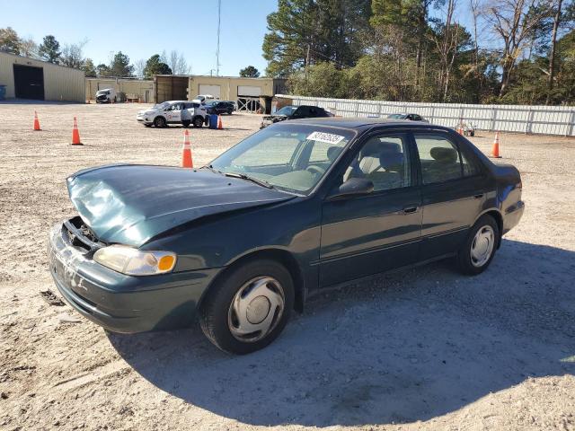 TOYOTA COROLLA VE 1999 with VIN 2T1BR12E4XC140582 - Photo from auction